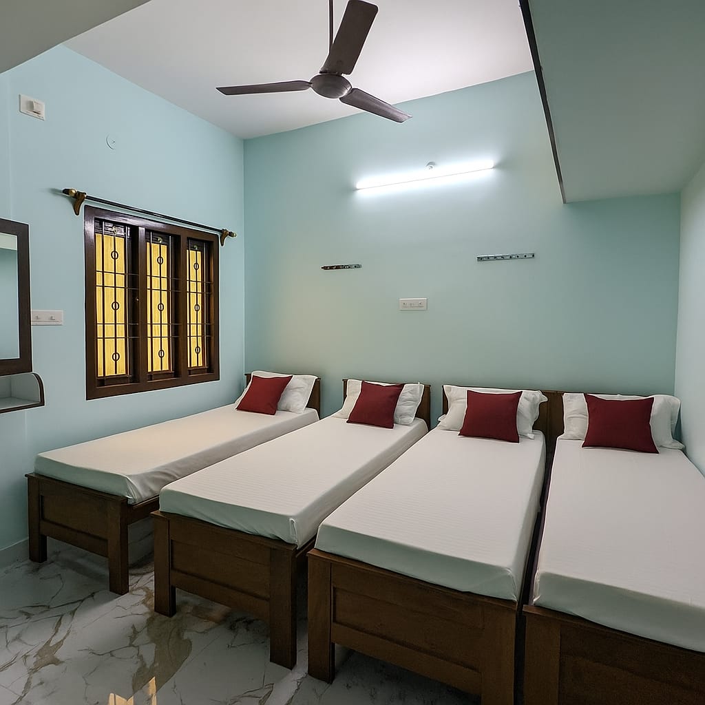 Friends Nest - Four Sharing AC + Balcony Room